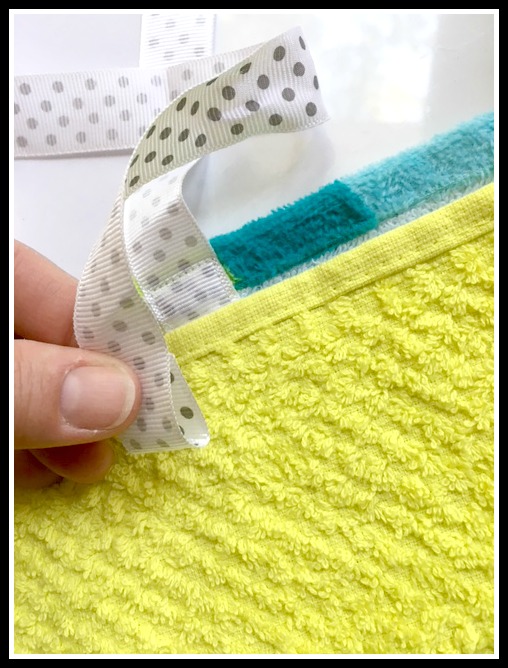 Make a beach towel into the beach bag! This is an easy sewing project using just a beach towel and hand towel and straps. Turn the towel into your carry all! mybrightideasblog.com