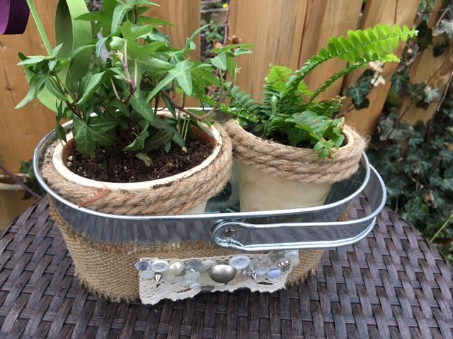 Decorate a flower pot with lace ribbon jute or burlap and buttons. All supplies from the Dollar Store. mybrightideasblog.com 
