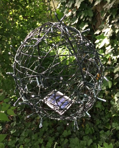 Make a Garden Solar Light from Planters and a string of Twinkle Lights. mybrightideasblog.com