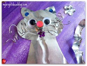 Easy kids craft made with Nuts, Bolts and Foil. Use random items to make super cool collage art! mybrightideasblog.com