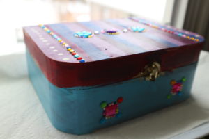 How to make a jewlelry box from a dollar store bare wood treasure box. Easy kids crafts! mybrightideasblog.com